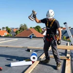 Expert dakdekker den haag working on a residential roof, showcasing professional roofing techniques and tools.